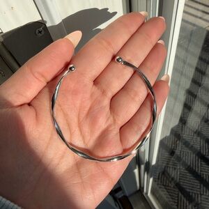 Elegant Silver Twist Bangle